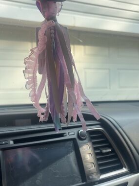 pink and purple car tassel